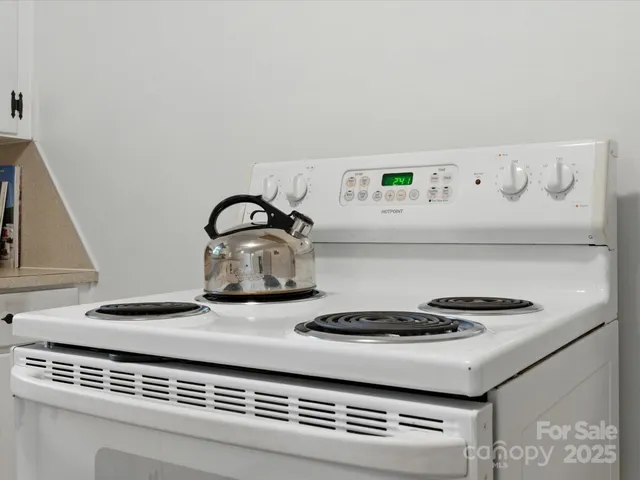 a kitchen with a refrigerator and a sink