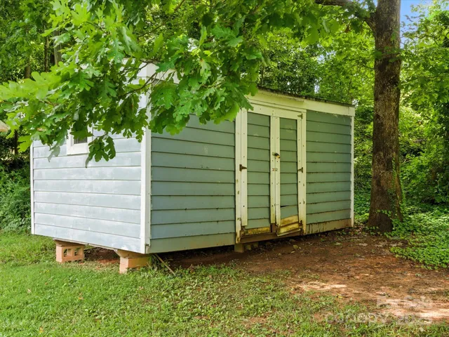 a view of a backyard with a garden