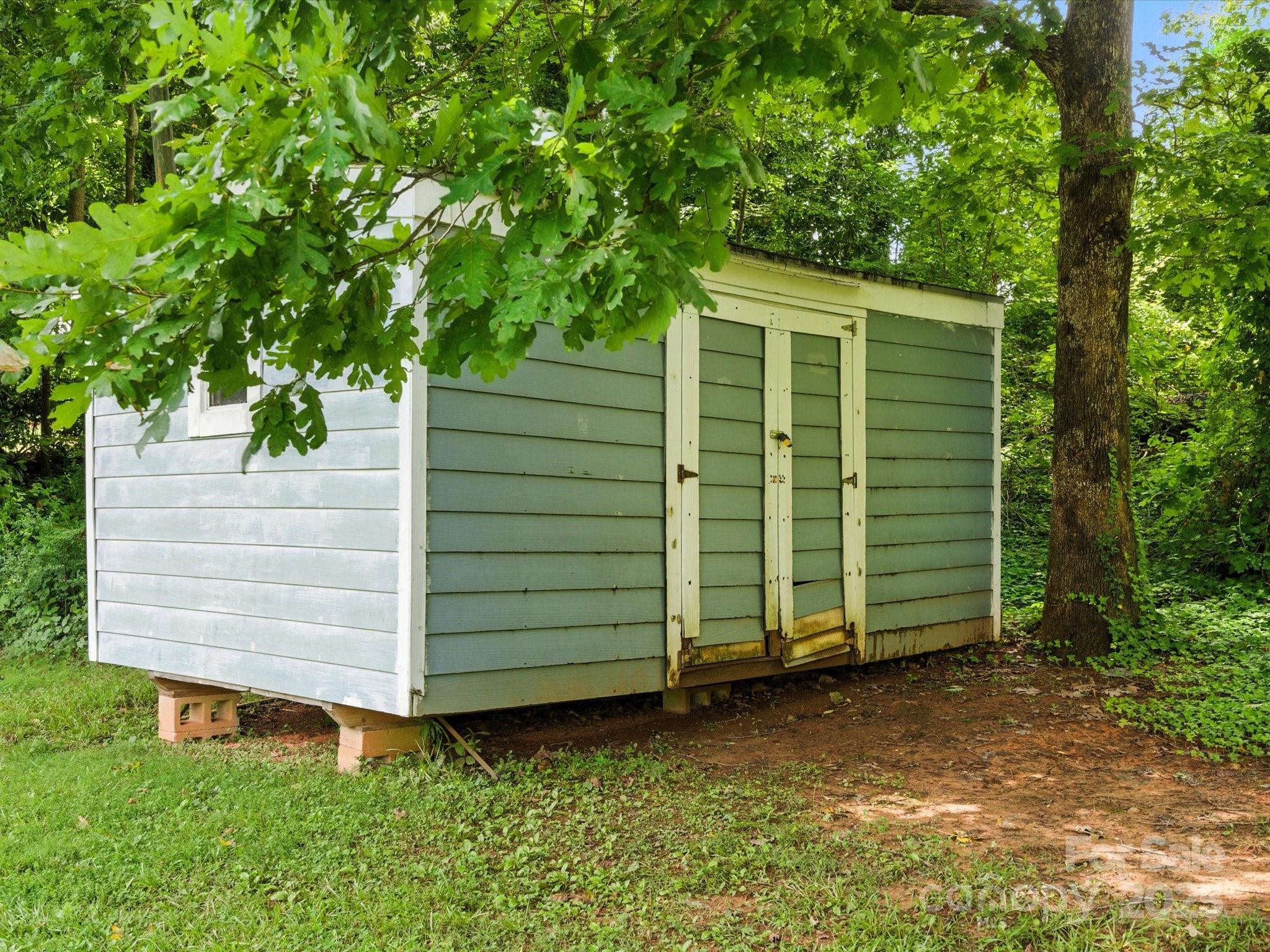 308 Taylor Drive Stanley, NC 28164 - Photo 23 of 26 a view of a house with a backyard