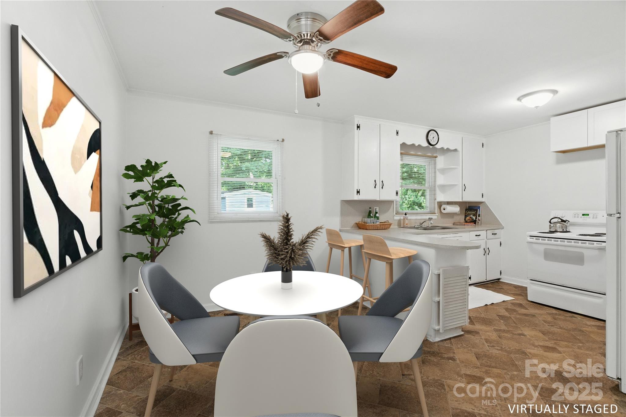 308 Taylor Drive Stanley, NC 28164 - Photo 7 of 26 a view of a dining room with furniture and a chandelier