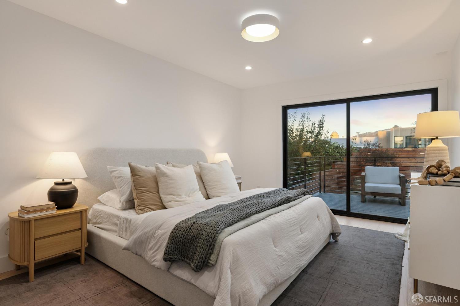 1726 30th Avenue San Francisco, CA 94122 - Photo 12 of 34 a bedroom with a bed and large window