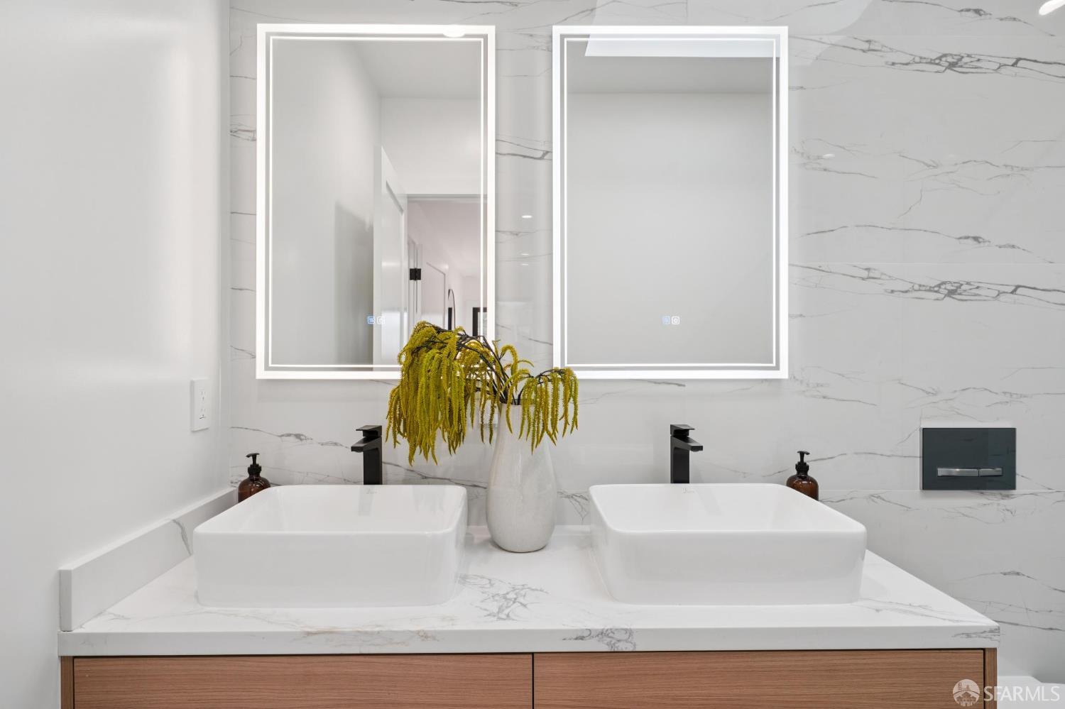 1726 30th Avenue San Francisco, CA 94122 - Photo 15 of 34 a bathroom with double vanity sink and a mirror
