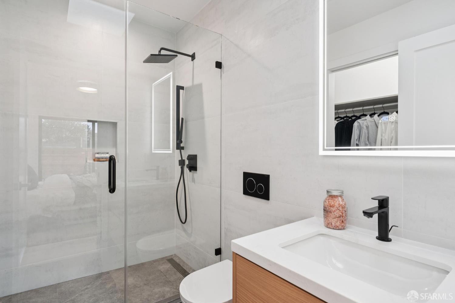 1726 30th Avenue San Francisco, CA 94122 - Photo 17 of 34 a bathroom with a sink toilet and shower