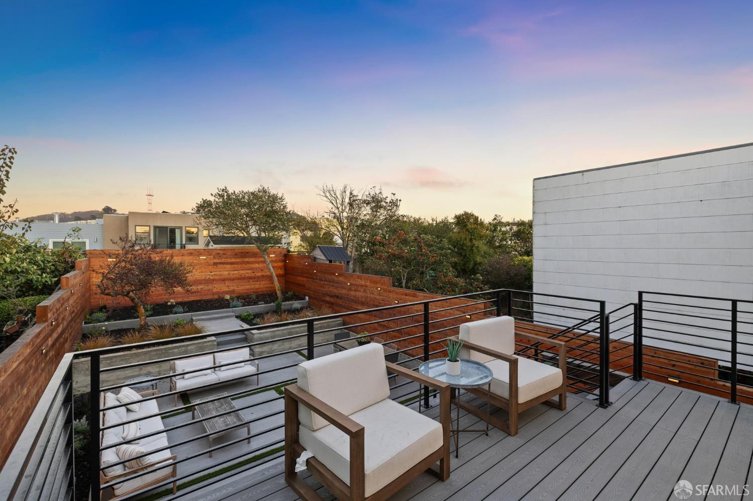 1726 30th Avenue San Francisco, CA 94122 - Photo 19 of 34 a view of a roof deck with wooden floor and city view