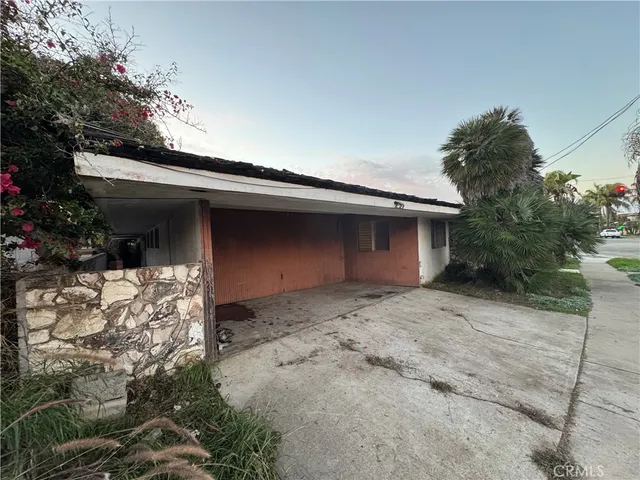 a house with a tree in front of it