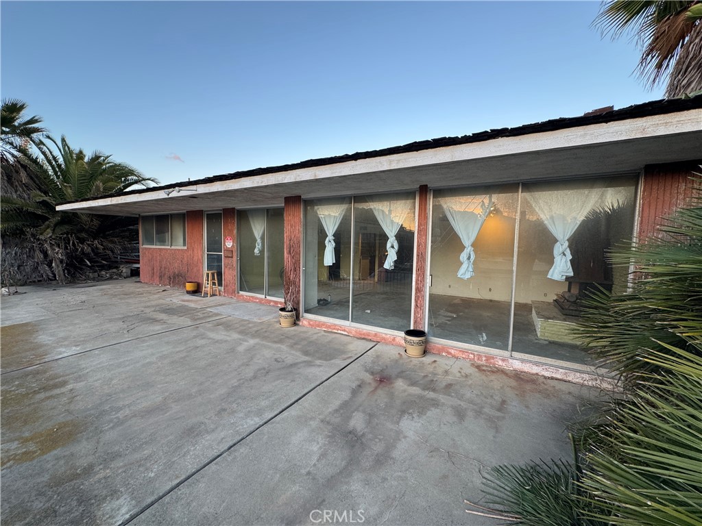 16591 Channel Huntington Beach, CA 92649 - Photo 10 of 11 a view of outdoor space with porch and furniture