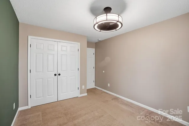 a view of hallway with washer and dryer