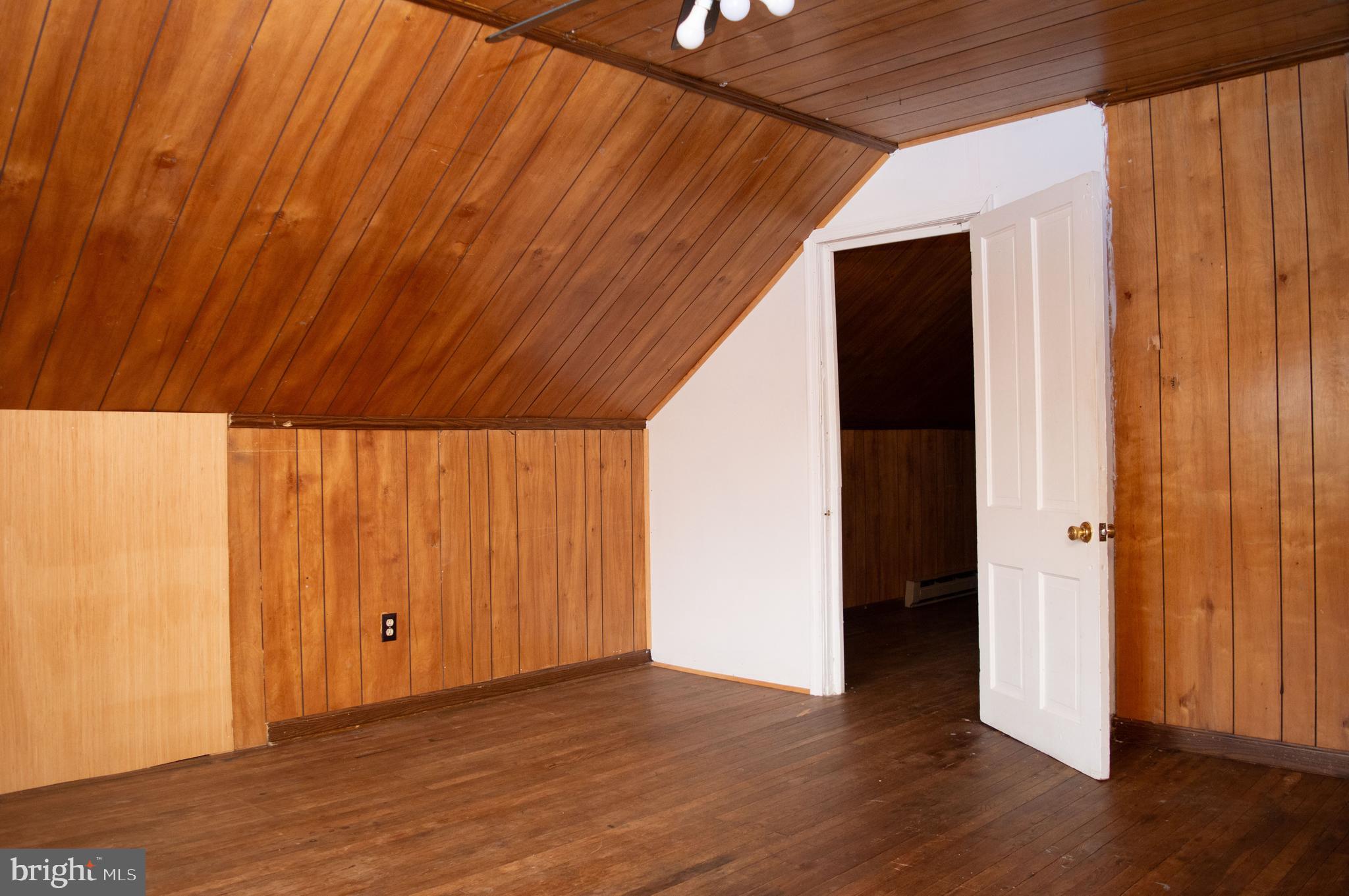 West Water Street Smithsburg, MD 21783 - Photo 23 of 23 a view of an empty room with wooden floor and a window