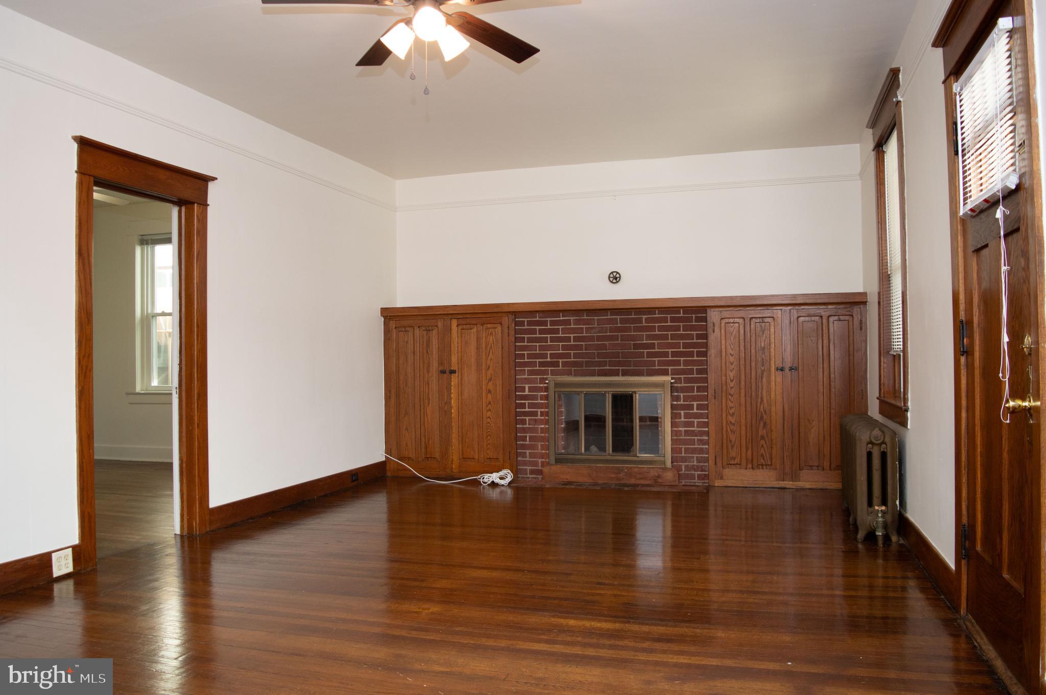 West Water Street Smithsburg, MD 21783 - Photo 5 of 23 a view of empty room with wooden floor