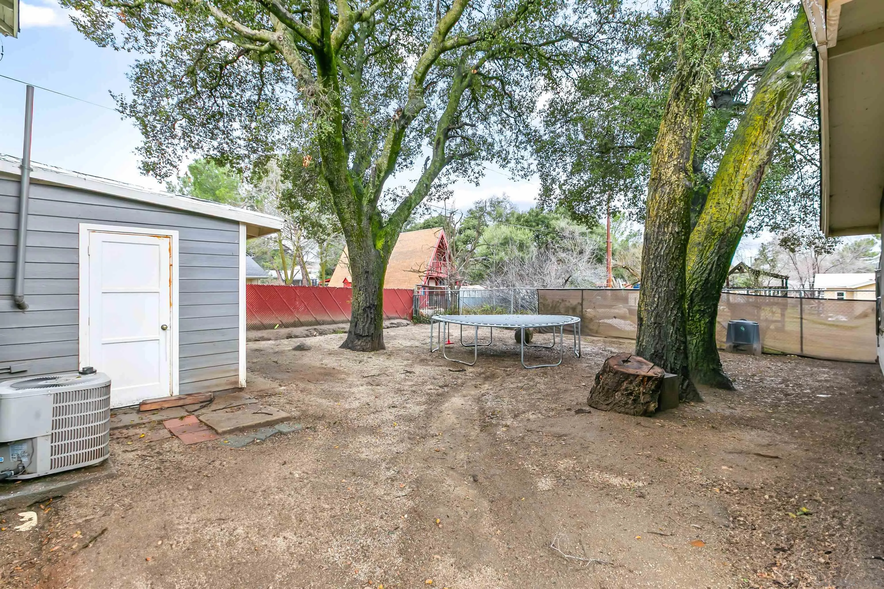 2414 Sage Drive Campo, CA 91906 - Photo 14 of 33 a view of backyard with a barn and large trees