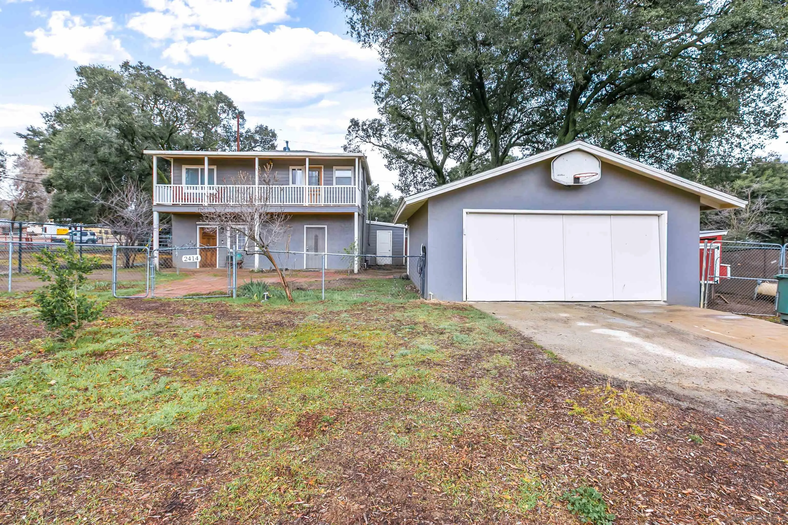 2414 Sage Drive Campo, CA 91906 - Photo 2 of 33 a view of a house with a yard and large tree