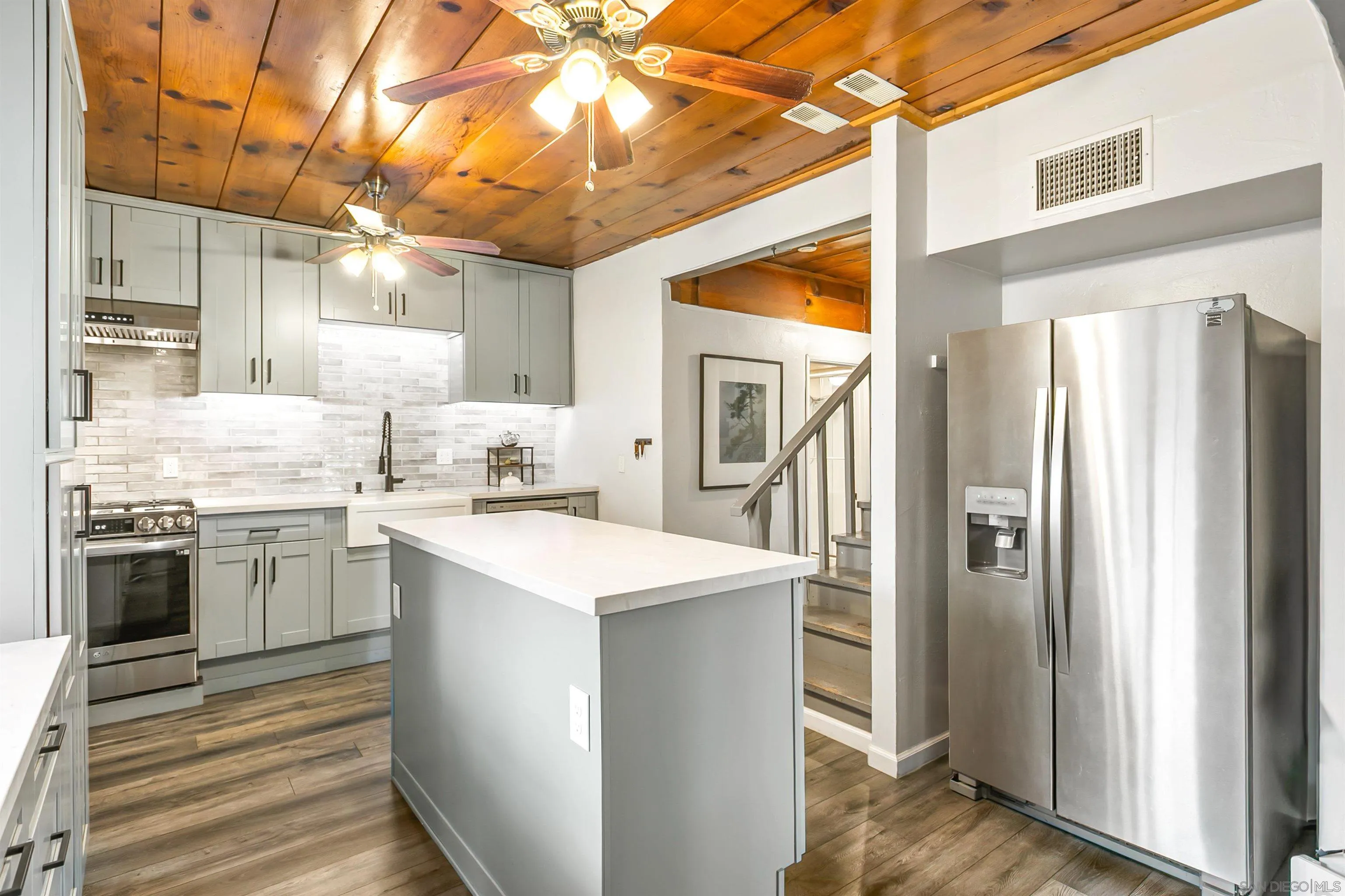 2414 Sage Drive Campo, CA 91906 - Photo 24 of 33 a kitchen with a sink stove and refrigerator