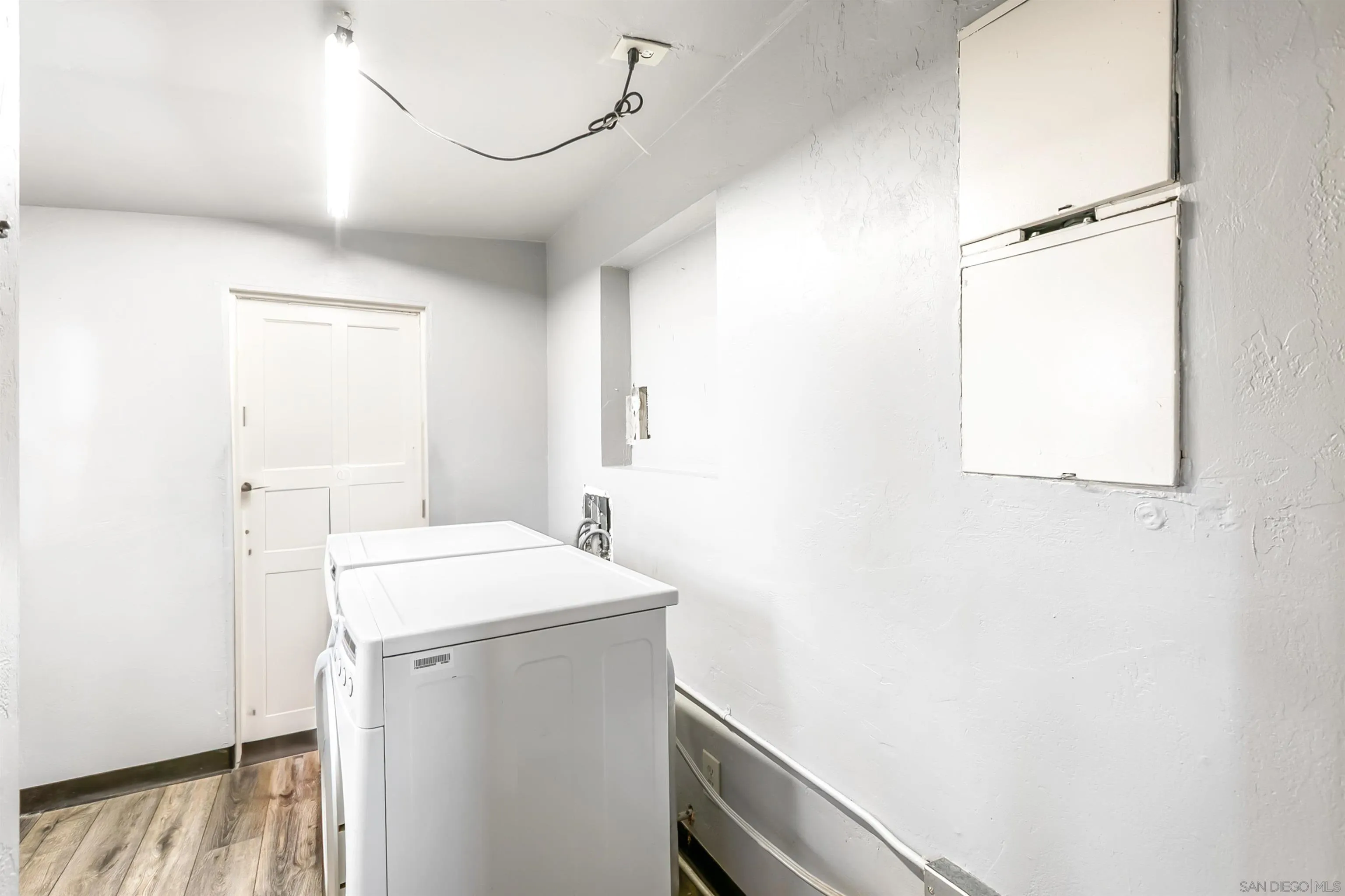 2414 Sage Drive Campo, CA 91906 - Photo 32 of 33 a utility room with dryer and washer