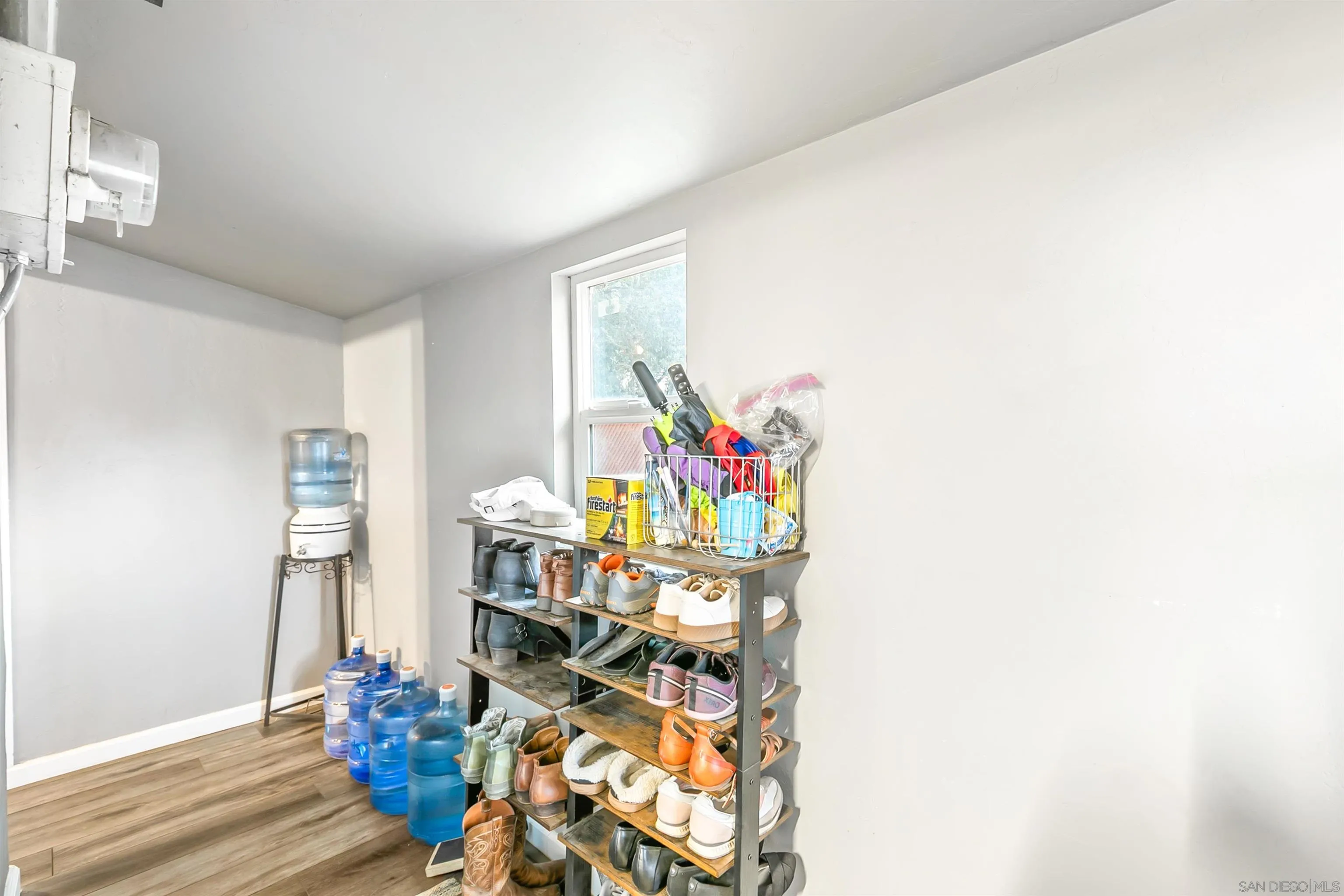 2414 Sage Drive Campo, CA 91906 - Photo 33 of 33 a living room with furniture and a flat screen tv