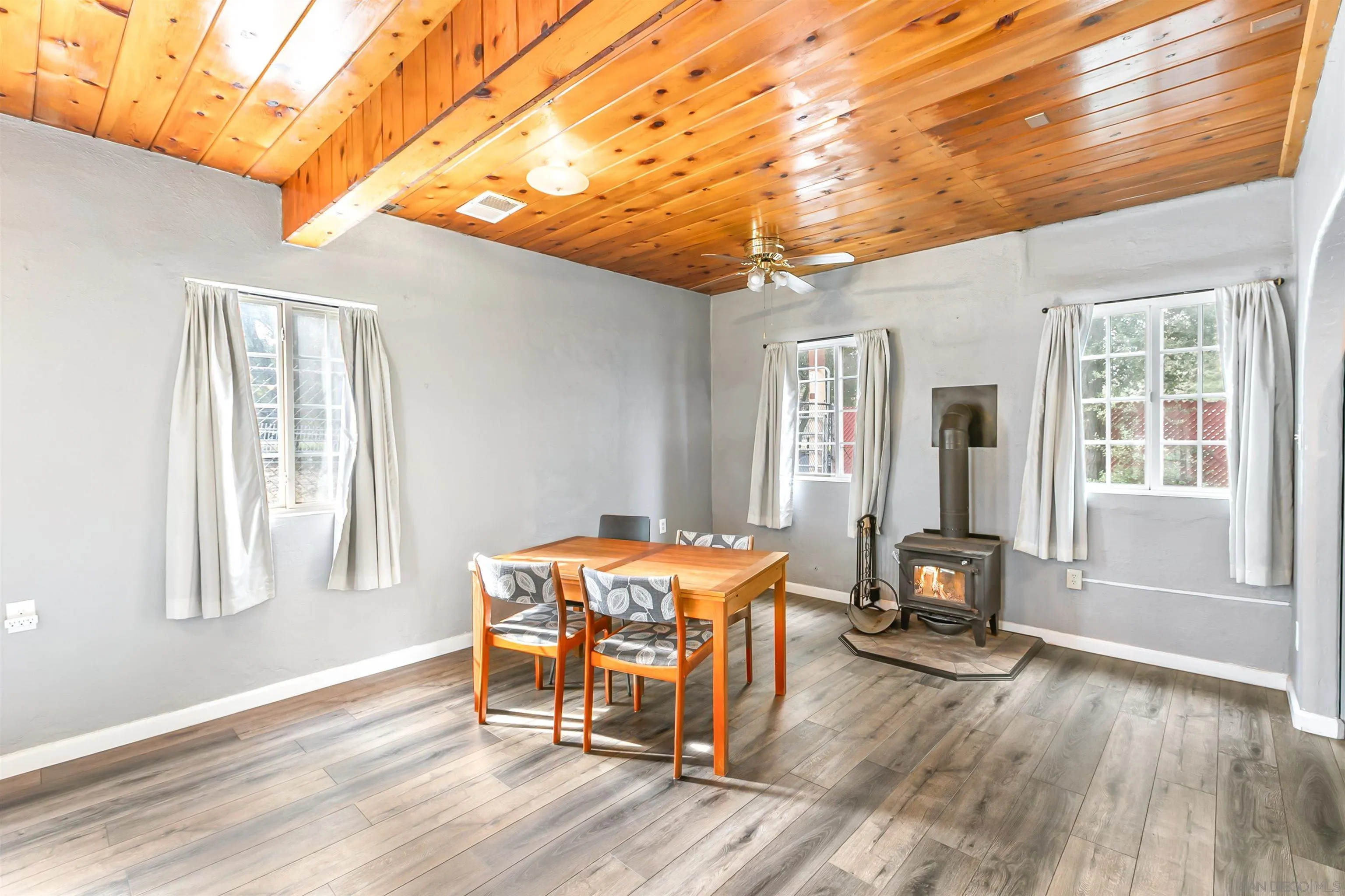 2414 Sage Drive Campo, CA 91906 - Photo 5 of 33 a view of a dining room with furniture window and wooden floor