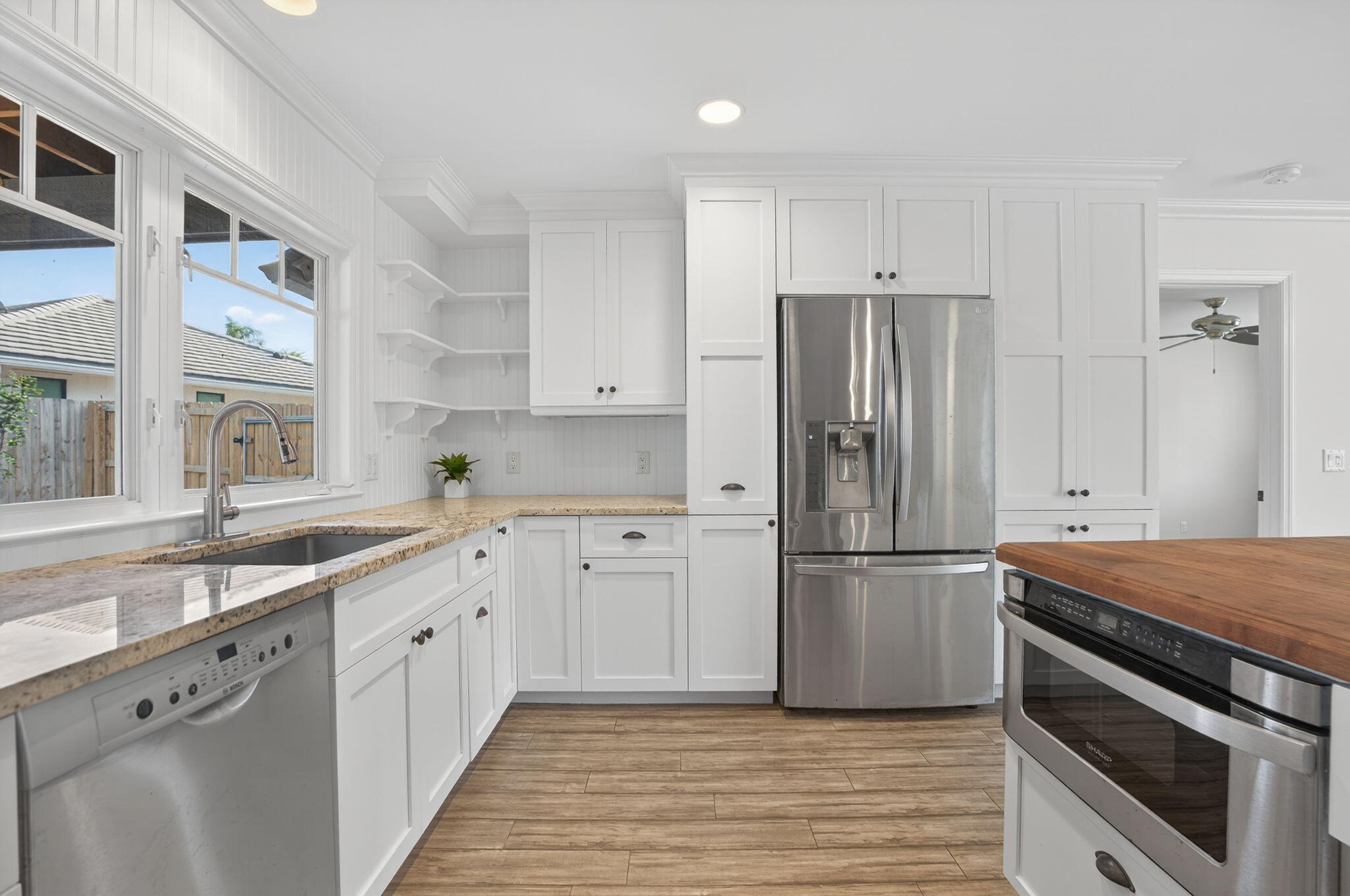 28 Hickory Hill Road Tequesta, FL 33469 - Photo 7 of 30 28 HH DISHWASHER, MICROWAVE & FRIDGE LON