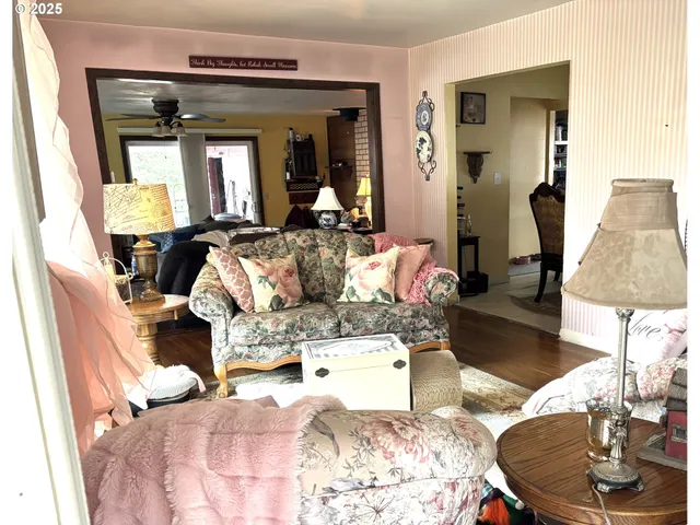 a bedroom with a bed and a mirror