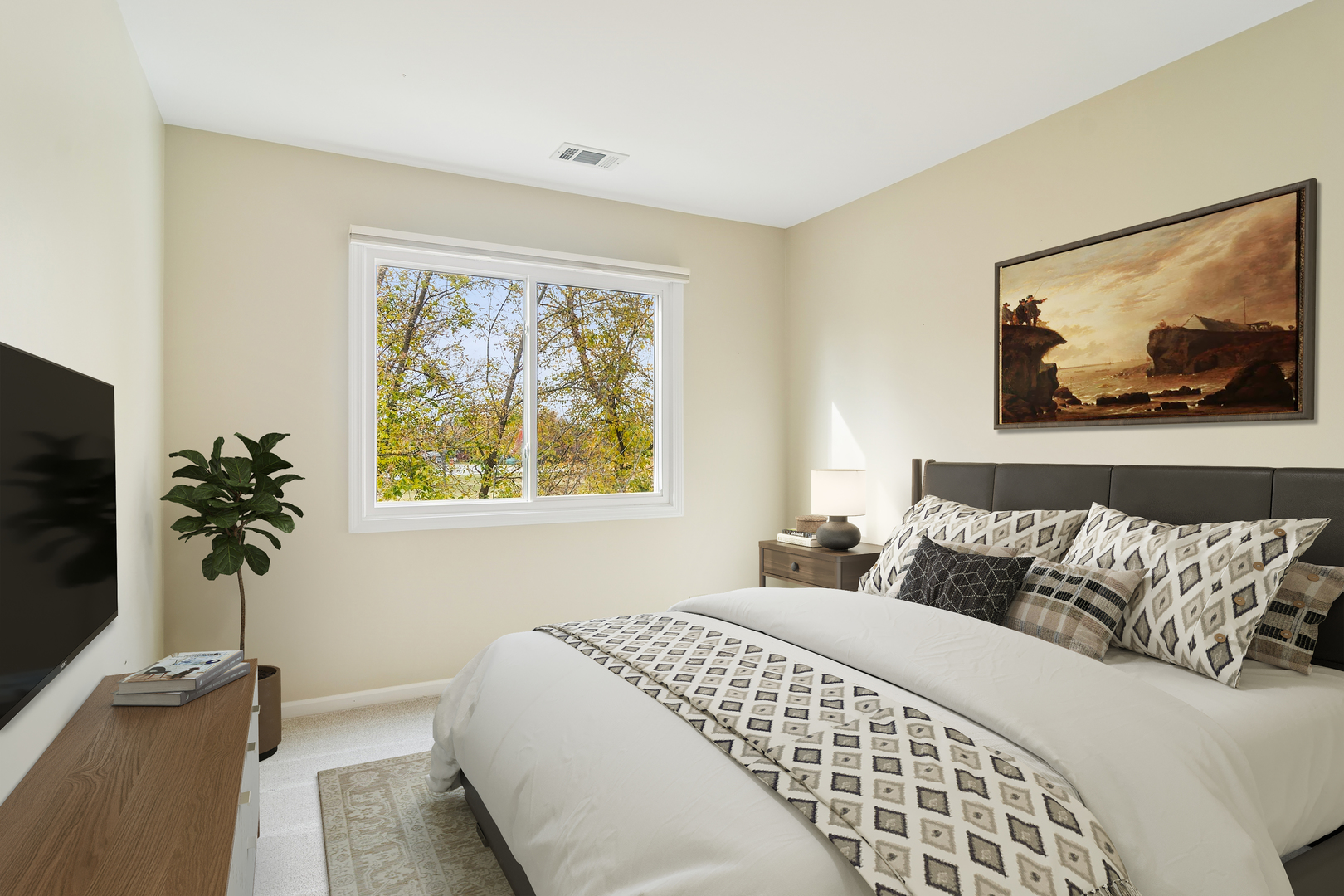 534 Park View Terrace, Unit 534 Buffalo Grove, IL 60089 - Photo 10 of 17 a bedroom with a bed and a painting on the wall