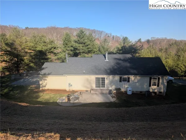 a view of a water pond with an outdoor seating