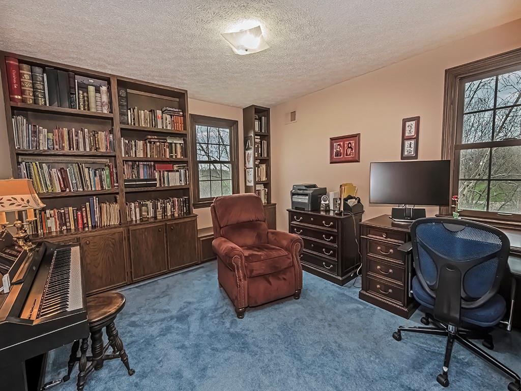 402 Dorseyville Road Pittsburgh, PA 15215 - Photo 17 of 33 a view of a livingroom with workspace and a window