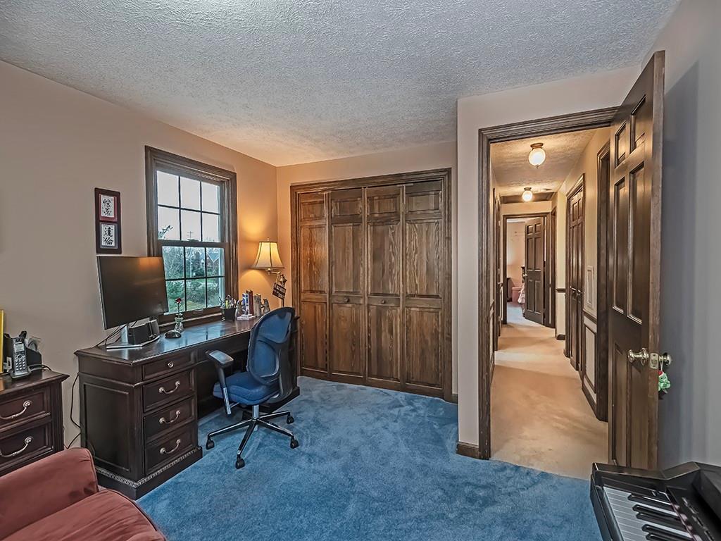 402 Dorseyville Road Pittsburgh, PA 15215 - Photo 18 of 33 a view of a workspace with furniture and a window