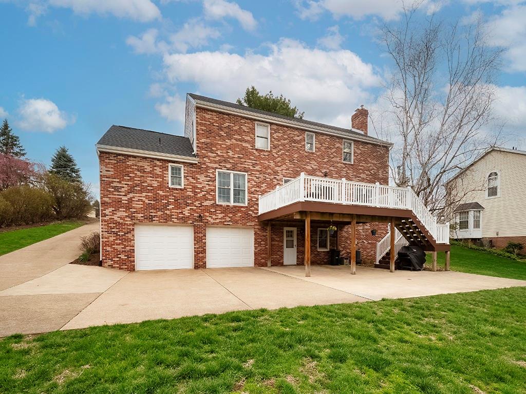 402 Dorseyville Road Pittsburgh, PA 15215 - Photo 31 of 33 a view of a house with a yard and sitting area