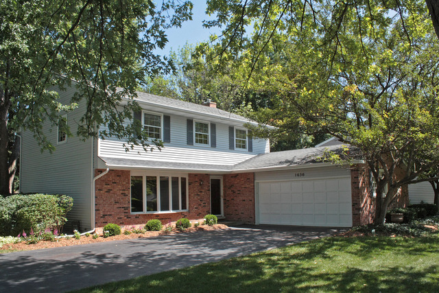 1636 Fender Road Naperville, IL 60565 - Photo 1 of 20 a front view of a house with a yard