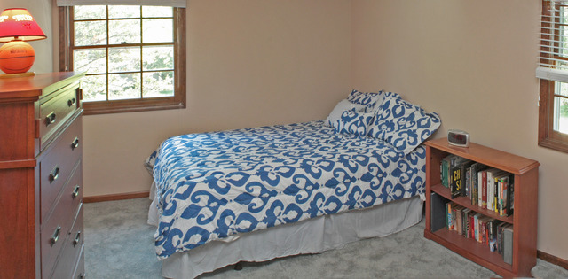 1636 Fender Road Naperville, IL 60565 - Photo 11 of 20 a bedroom with a bed and a window