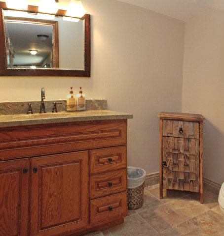 1636 Fender Road Naperville, IL 60565 - Photo 8 of 20 a bathroom with a granite countertop sink and a mirror