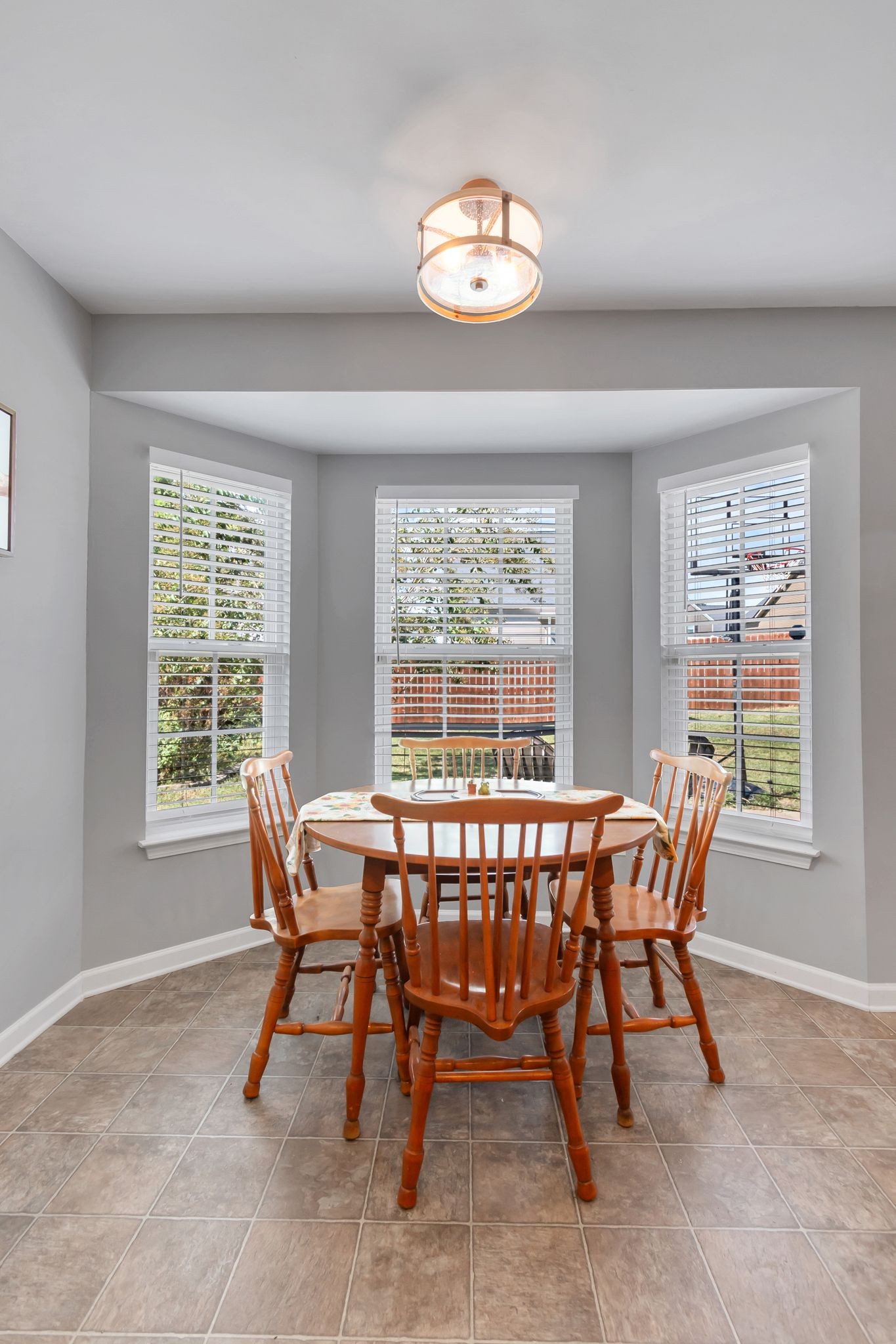 2032 Red Jacket Trace Spring Hill, TN 37174 - Photo 12 of 33 a view of a dining room with furniture window and outside view