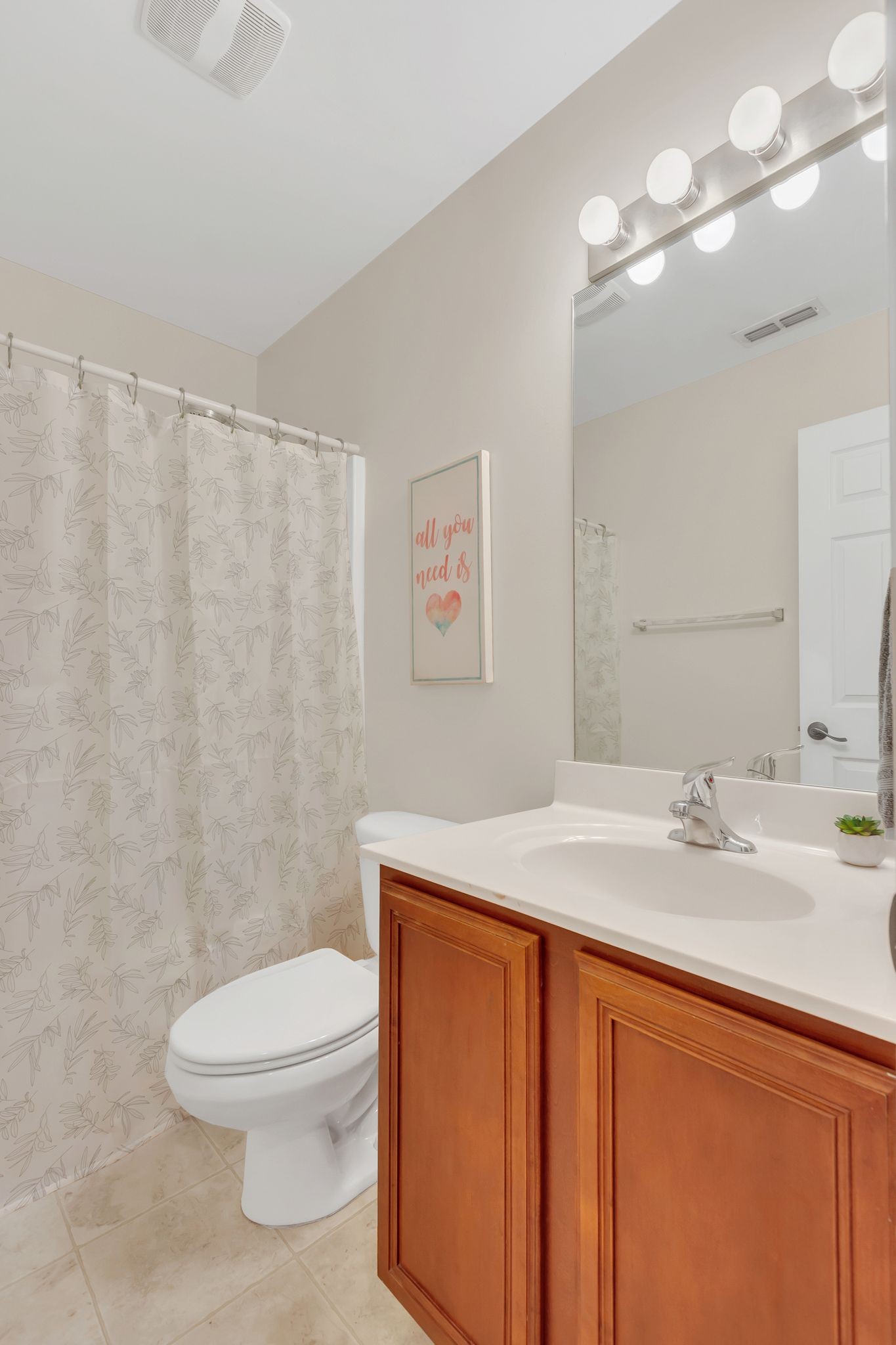 2032 Red Jacket Trace Spring Hill, TN 37174 - Photo 27 of 33 a bathroom with a sink a toilet and shower