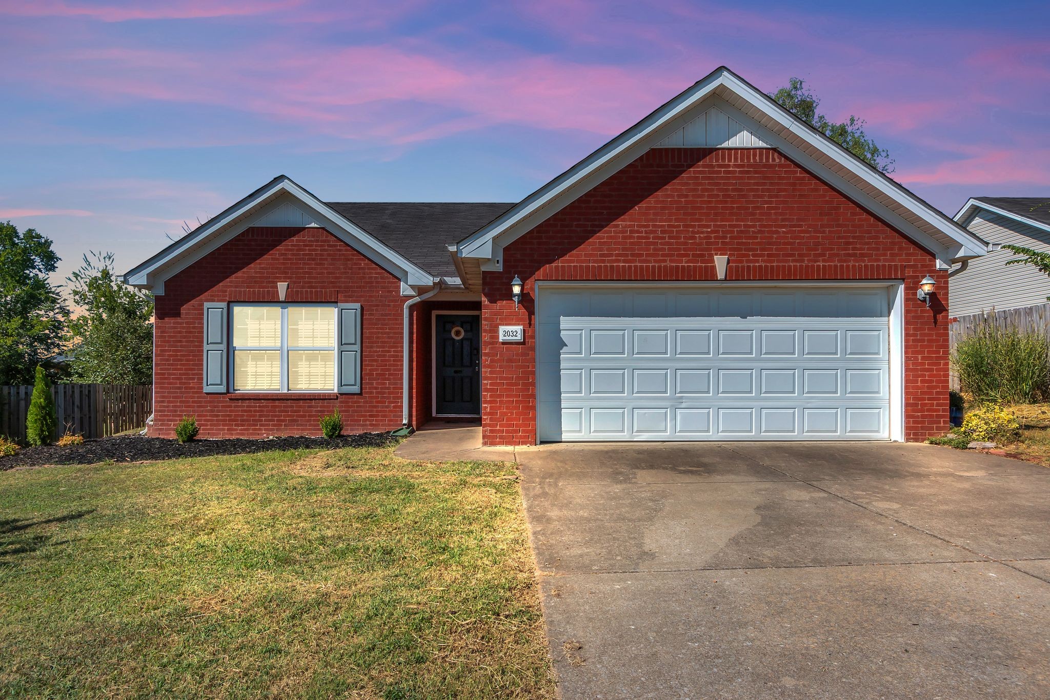 2032 Red Jacket Trace Spring Hill, TN 37174 - Photo 32 of 33 a front view of a house with a yard and garage