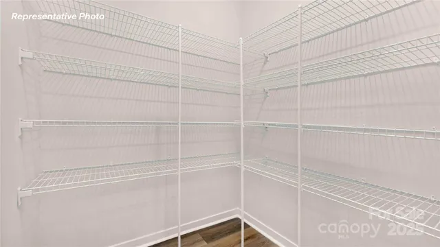 a view of a hallway with closet