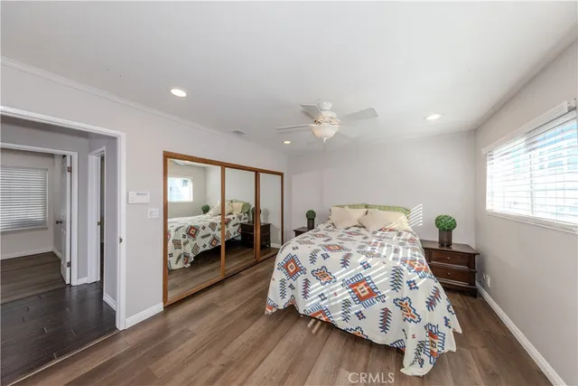 a view of kitchen with furniture and wooden floor