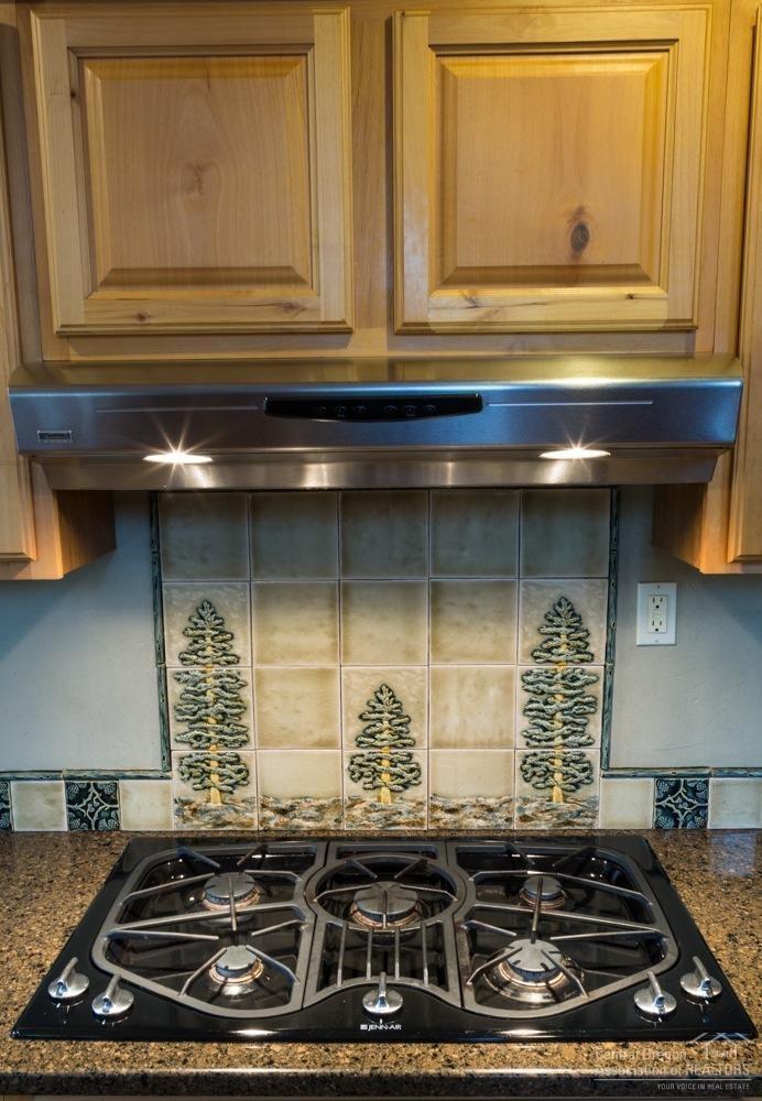 54265 Huntington Road Bend, OR 97707 - Photo 9 of 24 Kitchen has a six burner gas stove, upgr