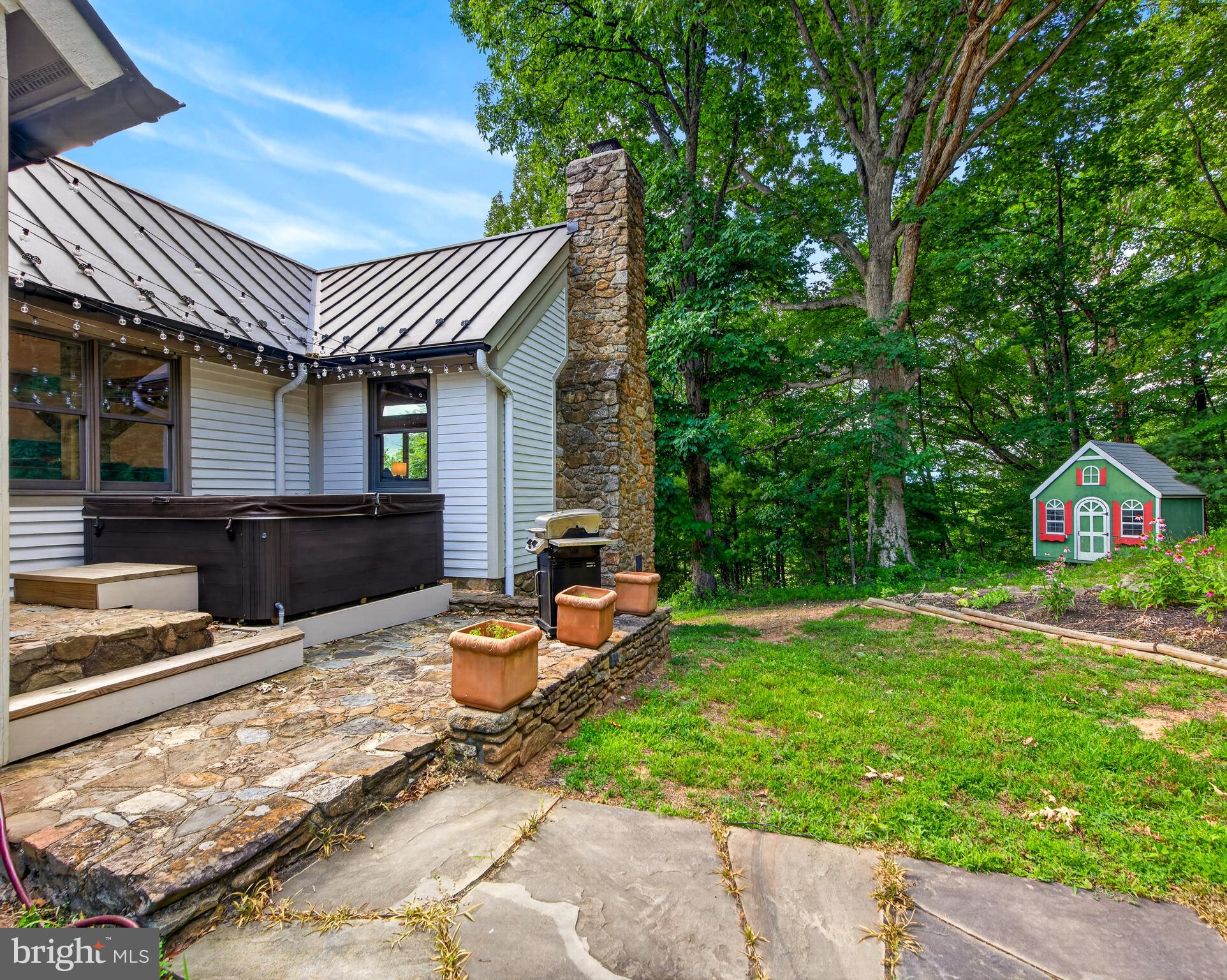 4028 South F T Valley Road Etlan, VA 22719 - Photo 84 of 101 a backyard of a house with yard and outdoor seating