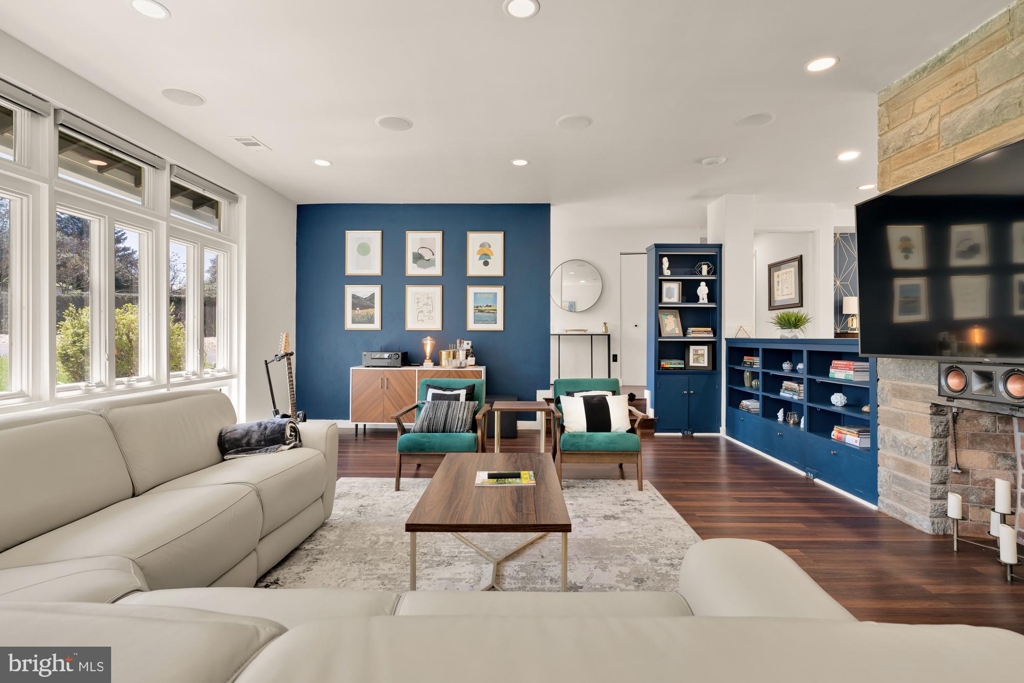1736 Overlook Drive Silver Spring, MD 20903 - Photo 12 of 42 a living room with furniture and a large window