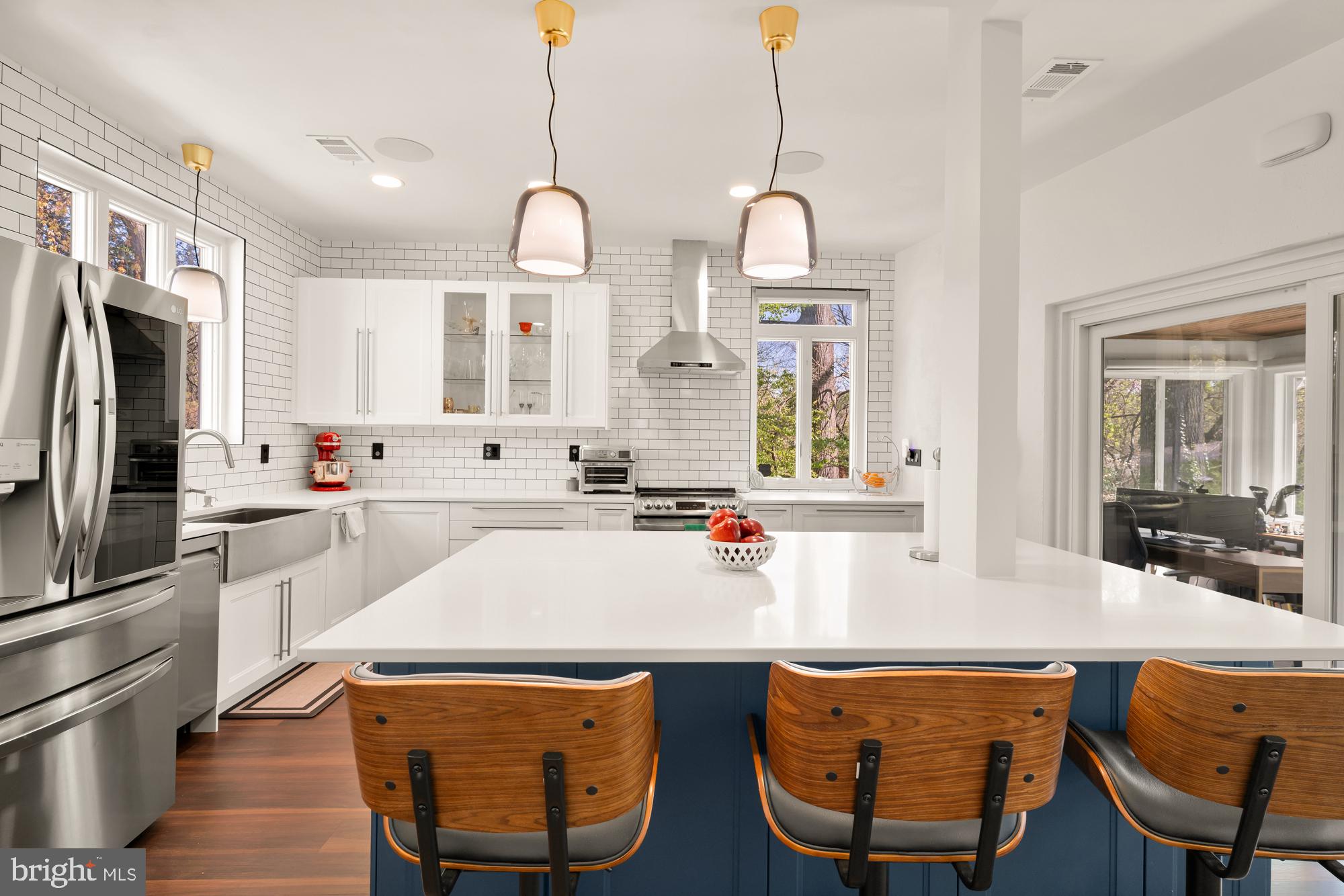 1736 Overlook Drive Silver Spring, MD 20903 - Photo 13 of 42 a kitchen with stainless steel appliances granite countertop a sink a stove and a refrigerator