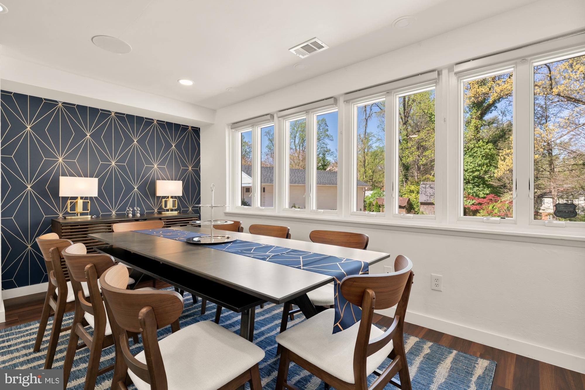 1736 Overlook Drive Silver Spring, MD 20903 - Photo 19 of 42 a view of a dining table and chairs in a room