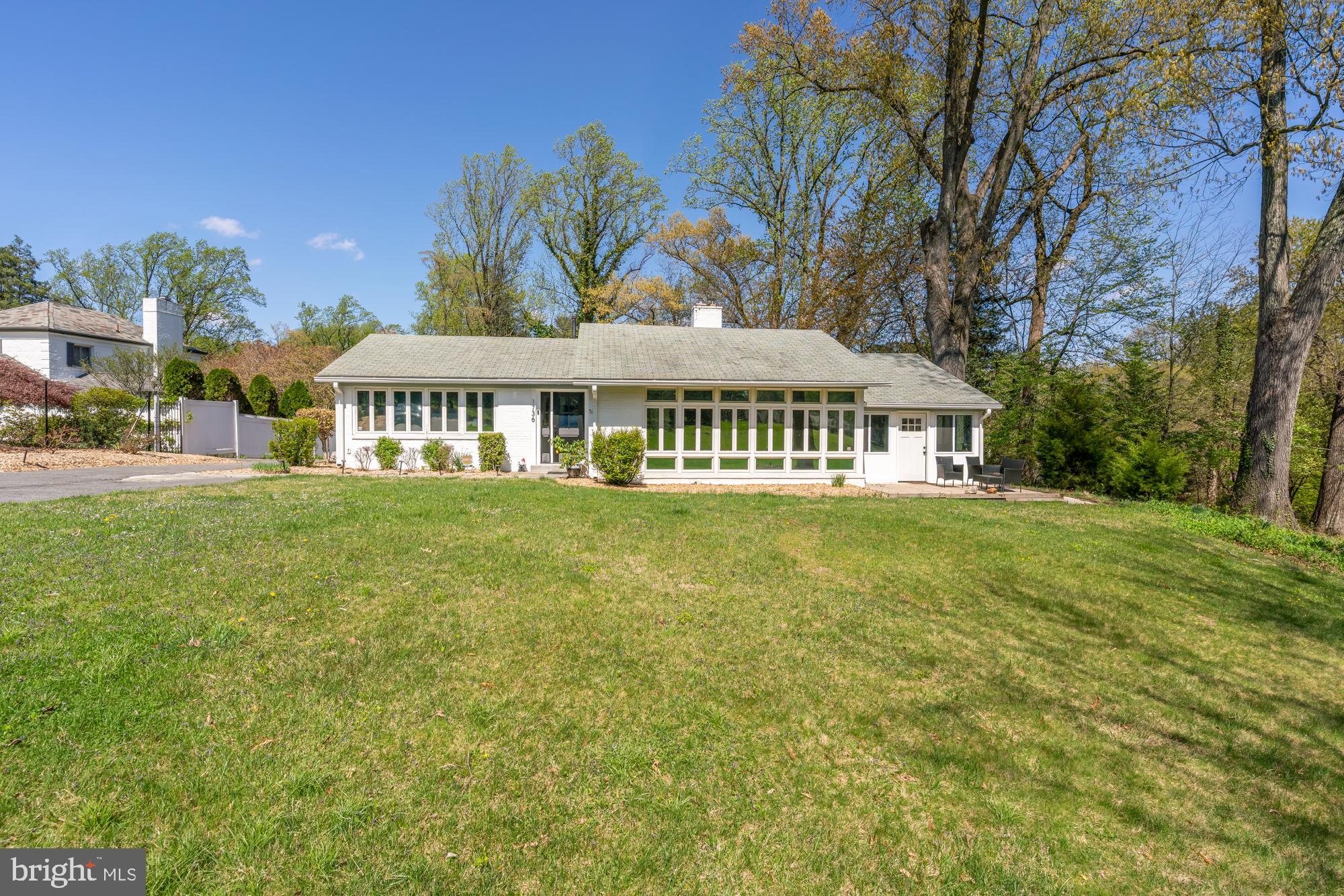1736 Overlook Drive Silver Spring, MD 20903 - Photo 2 of 42 a view of a house with garden and trees