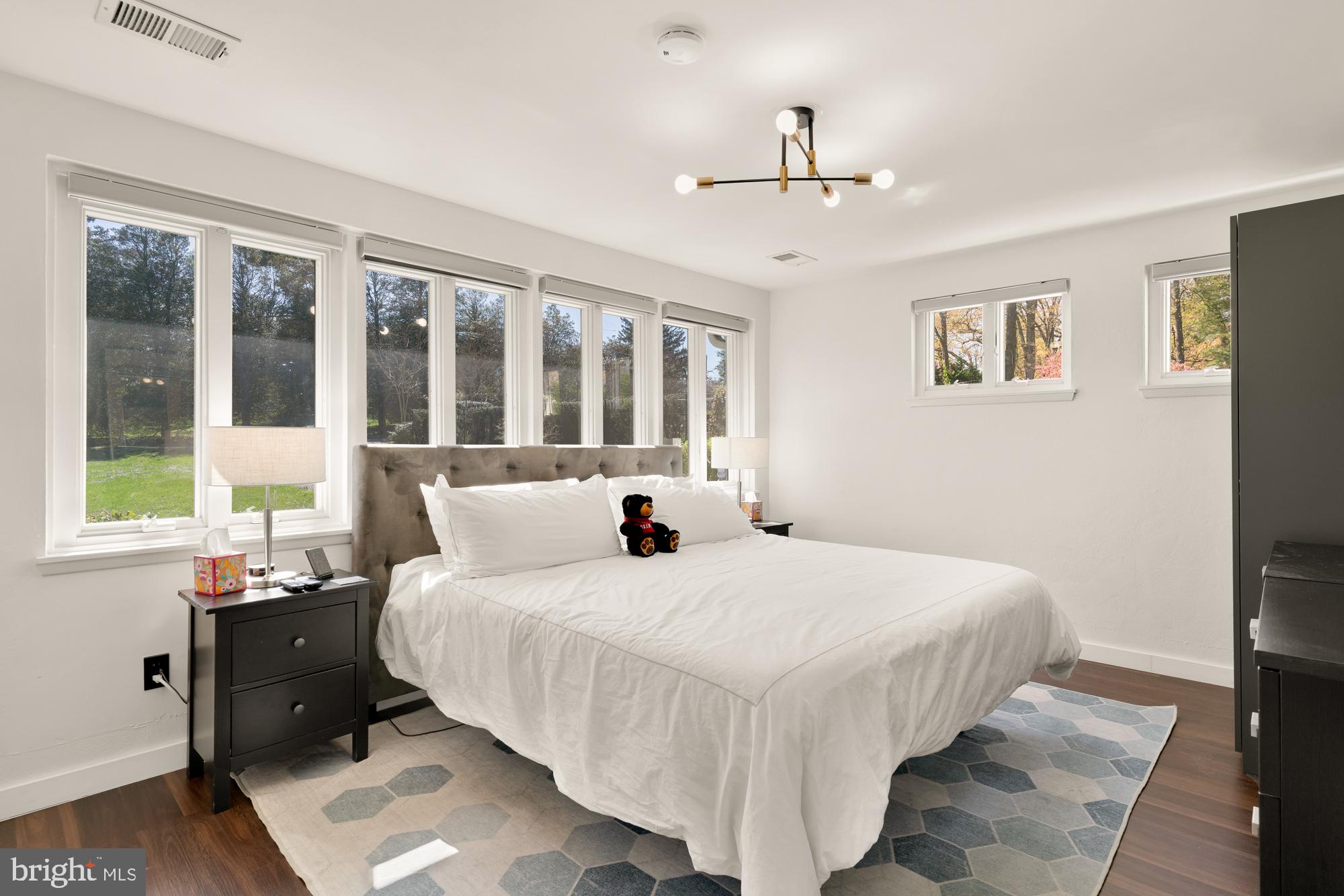 1736 Overlook Drive Silver Spring, MD 20903 - Photo 27 of 42 a bedroom with a bed and a large window