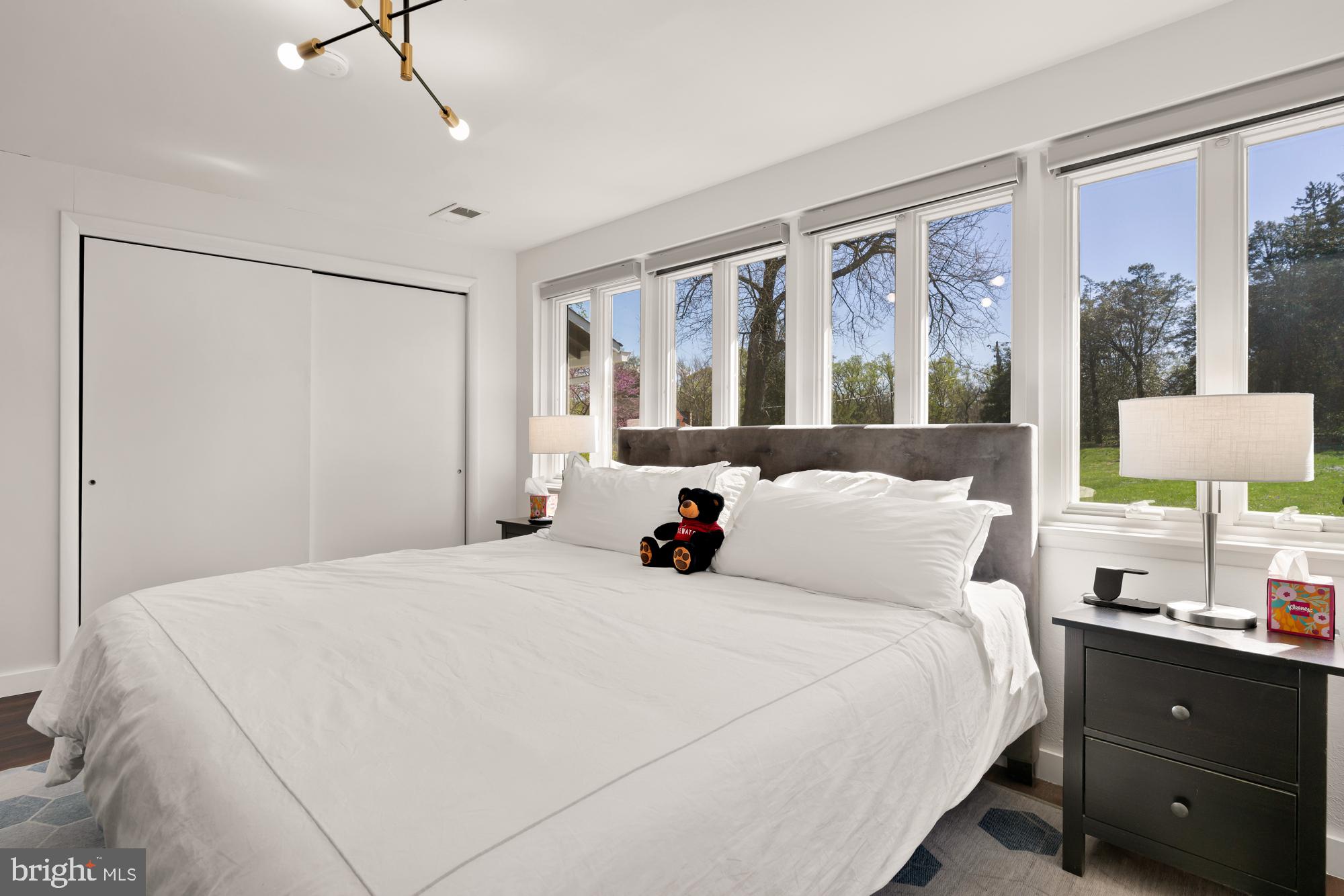 1736 Overlook Drive Silver Spring, MD 20903 - Photo 28 of 42 a bed room with a bed and a night stand