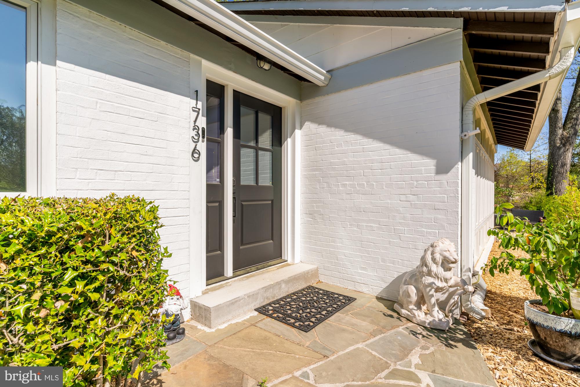 1736 Overlook Drive Silver Spring, MD 20903 - Photo 3 of 42 a couple of potted plants in front of door