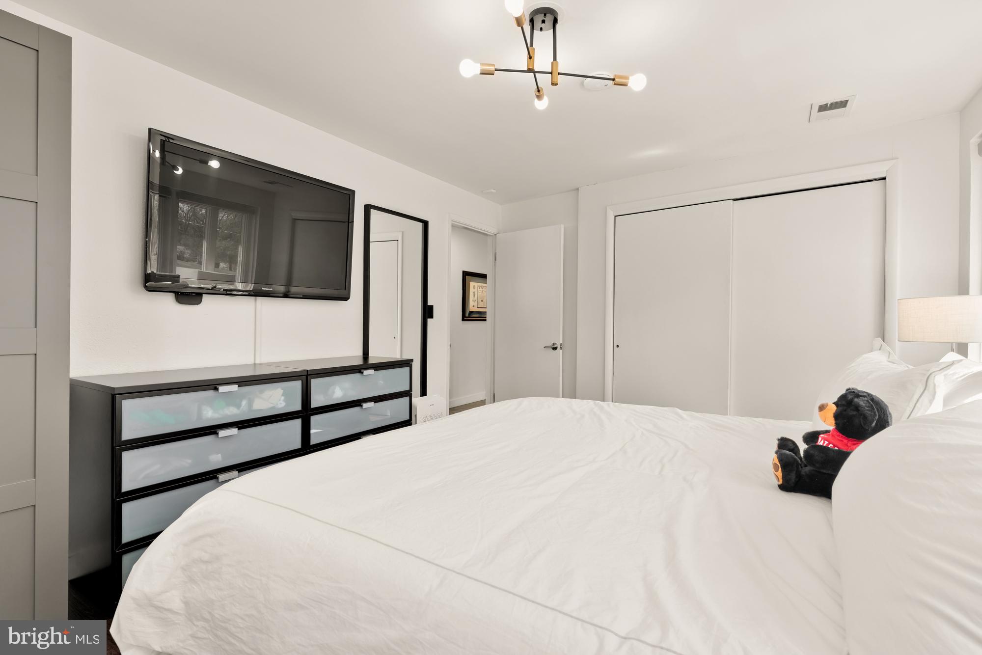 1736 Overlook Drive Silver Spring, MD 20903 - Photo 31 of 42 a bedroom with a bed and a window