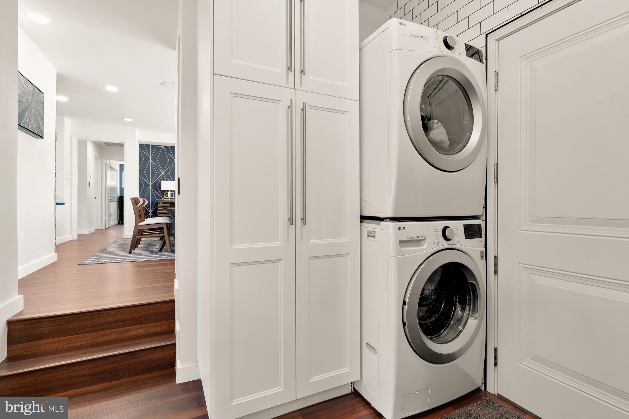 1736 Overlook Drive Silver Spring, MD 20903 - Photo 37 of 42 a view of a hallway with washer and dryer