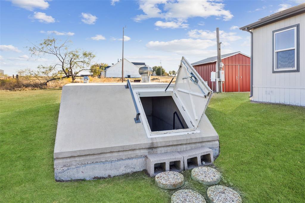 10240 Norrell Road Venus, TX 76084 - Photo 15 of 22 a view of a house with a backyard