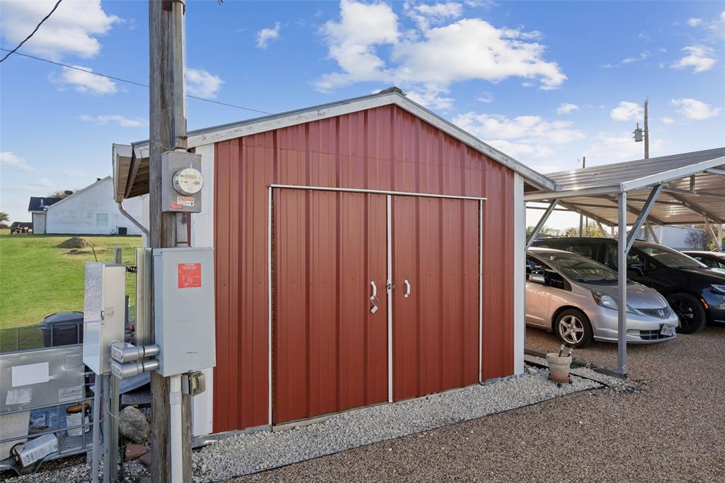 10240 Norrell Road Venus, TX 76084 - Photo 17 of 22 a view of a house with cars parked
