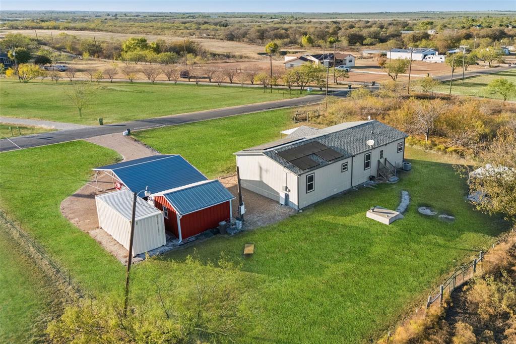 10240 Norrell Road Venus, TX 76084 - Photo 20 of 22 an aerial view of a house with a yard lake view and mountain view in back