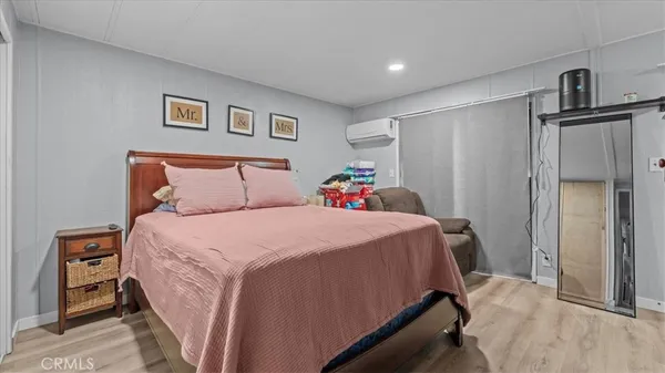 a bathroom with a sink vanity and a mirror