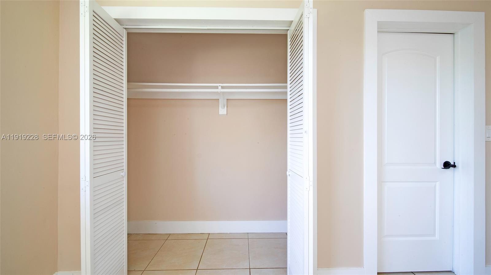 592 Northeast 150th Street, Unit 3 Miami, FL 33161 - Photo 18 of 22 a view of an empty room